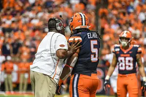 Chris Elmore, pictured last season, was part of a Syracuse offensive line that surrendered seven sacks last week.