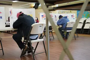 Voters cast their ballots at the Spiritual Renewal Center in Syracuse on Election Day. 