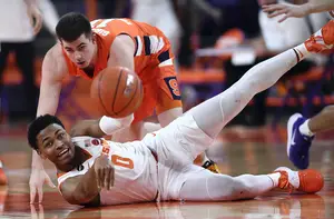 Clyde Trapp finds a loose ball off of Joe Girard III in Syracuse's 78-61 loss to Clemson.