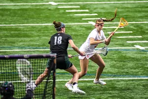 Sam Swart (pictured in 2019 vs Loyola) recorded four points in Syracuse's dominant 18-6 win over No. 5 Loyola.