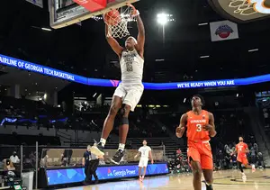 Georgia Tech center Moses Wright dunks in a 84-77 win over Syracuse. Wright was the ACC's player of the year this season. 