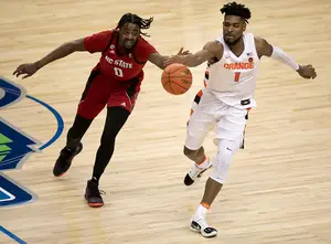 Quincy Guerrier runs for a loose ball against NC State in the ACC Tournament. No. 11 Syracuse faces No. 6 San Diego State on Friday night in the NCAA Tournament. 