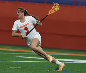 Midfielder Sam Swart charges with a free position shot against Stony Brook. The Orange have struggled with free position shots this season. 