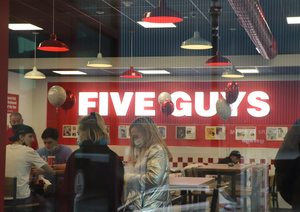 Five Guys opened in The Marshall, a luxury student apartment complex, on Tuesday.