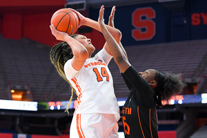 The 6-foot-7 freshman averaged 13.6 points and 8.0 rebounds per game during her only season with Syracuse.
