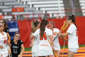 Emma Tyrrell scored four goals to help lead No. 3-seed Syracuse to a 20-8 win over Loyola. 