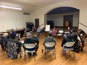 Nearly 20 Syracuse residents Tuesday at the Beauchamp Branch Library for a community teach-in on healthcare inequality in New York state.