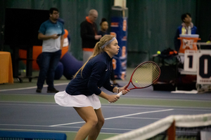 Polina Kozyreva won her doubles match alongside Miyuka Kimoto en route to a Syracuse 7-0 win over Buffalo. 