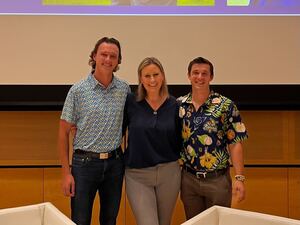 Ivan Traczuk (left) and Biko Skalla (right) pose with Newhouse professor Olivia Stomski (middle) during a panel conversation on Sep. 13. 