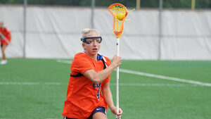 After allowing eight first-quarter goals, SU head coach Kayla Treanor shifted from zone to man-to-man defense, tasking freshman Kaci Benoit with guarding Tewaaraton winner Izzy Scane.