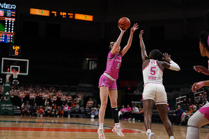 Georgia Woolley drained four of SU's 12 3-pointers in its victory over Virginia.