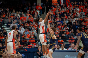 Chris Bell knocked down four 3s to help Syracuse survive a late Notre Dame comeback attempt. 