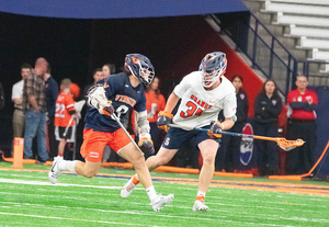 Long pole Billy Dwan scored the game-tying goal against No. 4 Virginia with his back turned to the cage, setting up No. 6 Syracuse for a late comeback win.