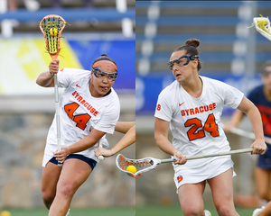 Emma Ward (left) and Emma Tyrrell (right) combined for nine points in No. 4 Syracuse's win over No. 6 Virginia Friday.