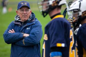 Mike Messere became the all-time winningest high school lacrosse coach with his 748th victory in his 36-year career at West Genesee. 