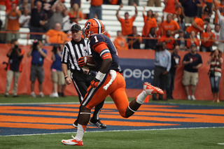 Syracuse tailback Ashton Broyld runs into the end zone for his first career touchdown in the first half.