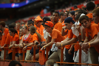 Students watch as Syracuse is defeated in their season opener.
