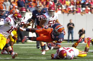 Syracuse Orange running back Jerome Smith #45 is tackled in the first half.