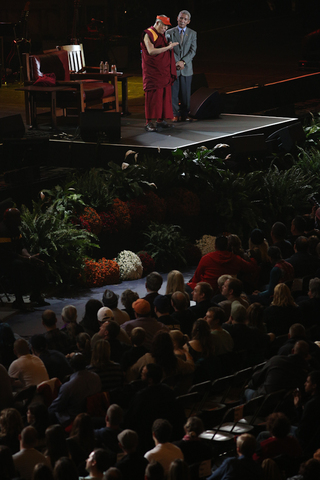 The Dalai Lama addresses the Carrier Dome crowd.