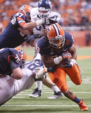 SU running back Prince-Tyson Gulley breaks through the line and during a second-quarter scoring drive. 