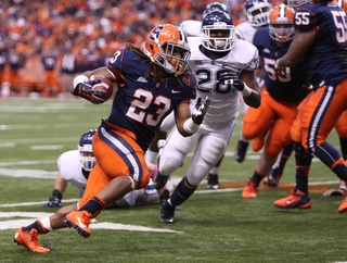 Prince-Tyson Gulley bursts down the field in Syracuse's 40-10 victory over UConn.