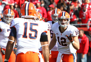 Quarterback Ryan Nassib (12) barks out signals to his offense in Saturday's game against Rutgers.