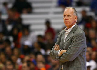 Head coach Doug Collins of the Philadelphia 76ers looks on during the preseason game against the New York Knicks.