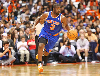 Raymond Felton of the New York Knicks drives the ball down the court.