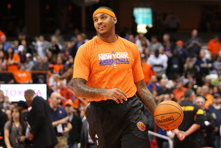 Carmelo Anthony of the New York Knicks warms up before the preseason game against the Philadelphia 76ers.
