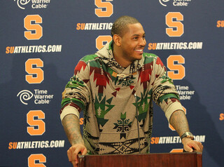 Carmelo Anthony of the New York Knicks answers questions during the postgame press conference after his return to the Carrier Dome after the preseason game against the Philadelphia 76ers at the Carrier Dome. 