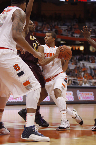 Guard Michael Carter-Williams drives in the paint in Syracuse's 103-60 win over Bloomsburg.