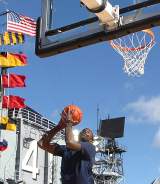 Baye Moussa Keita puts the ball up to the basket during media day on Nov. 10, 2012 before Sunday's Battle on the Midway game against the San Diego State Aztecs aboard the USS Midway.