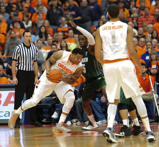 Syracuse forward DaJuan Coleman fights for an angle to the hoop in the paint.