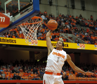 Syracuse guard Michael Carter-Williams rises to dunk in SU's 88-57 win over Wagner.