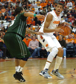 Syracuse guard Michael Carter-Williams protects the ball.