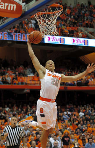 Syracuse guard Brandon Triche goes up to the basket.