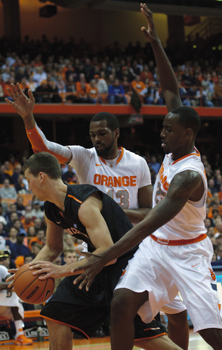 James Southerland and Rakeem Christmas attempt to trap a Princeton player.