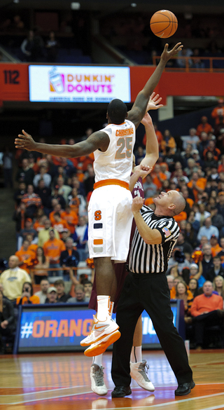 Rakeem Christmas goes up for the opening tip in SU's game against Colgate.
