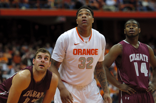 DaJuan Coleman looks to the basket during a free throw in Syracuse's game against Colgate on Sunday.