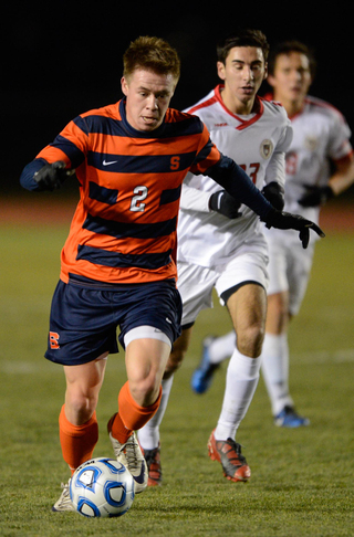 Jordan Vale dribbles downfield during SU's 1-0 victory over Cornell in Ithaca, N.Y. on Thursday night. It was the Orange's first-ever NCAA tournament win.