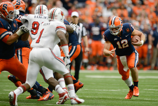 Quarterback Ryan Nassib takes a keeper to his left against Louisville.