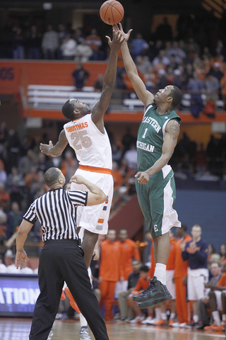 Rakeem Christmas goes up for the opening tip against Eastern Michigan.