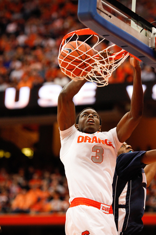 Forward Jerami Grant finishes a dunk in Syracuse's win over Monmouth.