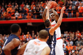 C.J. Fair takes a jump shot in Syracuse's win 108-56 win over Monmouth. Fair scored 14 points and grabbed 10  rebounds.