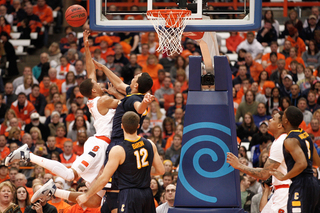 Syracuse guard Michael Carter-Williams attempts a layup in the Orange's win over Canisius.