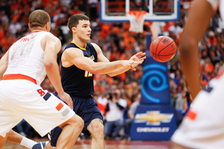 Canisius guard Billy Baron makes a pass.