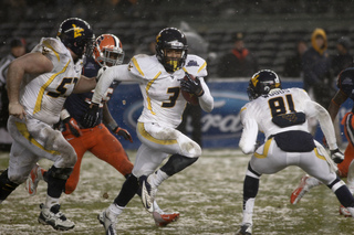 West Virginia receiver Stedman Bailey looks for room to run in the first half.