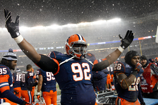 Defensive tackle Davon Walls celebrates as the fourth quarter ends.