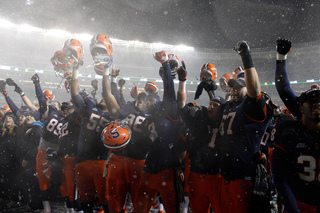 Syracuse celebrates after the game.