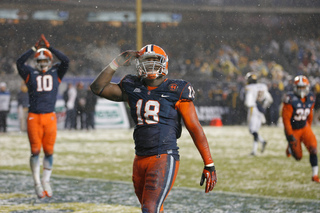 Linebacker Siriki Diabate celebrates after a Syracuse safety in the Pinstripe Bowl.